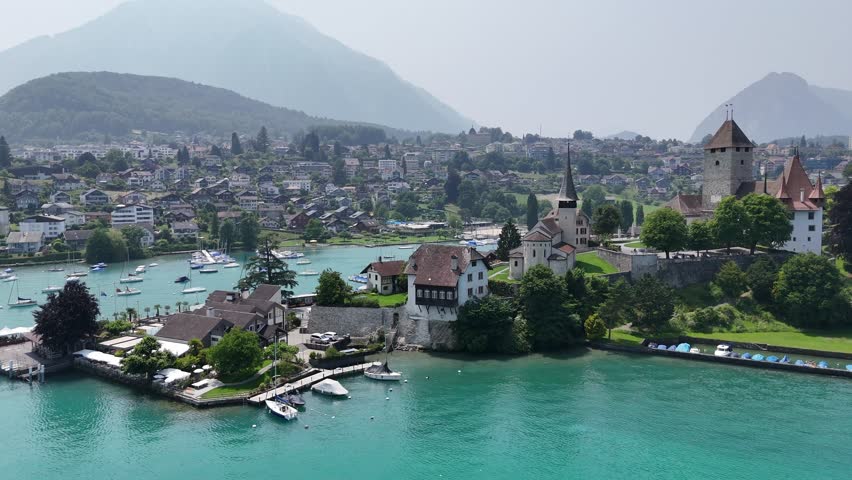 Lakeside town of Spiez Town lake Thun Switzerland drone, aerial