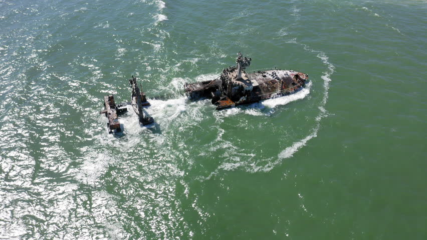 Slow panning drone shot of the Zeila Shipwreck stranded off Namibia’s Skeleton Coast