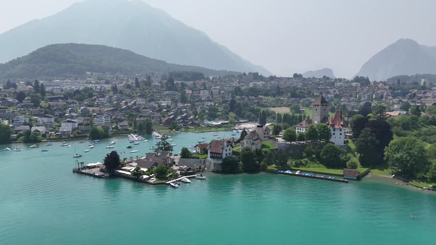 Spiez Town on lake Thun Switzerland Panning drone aerial