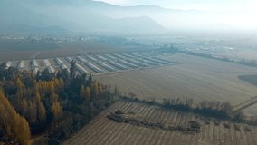 Warehouses at Rancagua suburbs in wide aerial shot on a hazy autumn morning - Powered by Shutterstock - Get 15% off with code: PIKWIZARD15