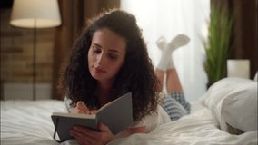 Woman girl dreaming writing notebook in bed Caucasian female teen thoughtful write diary thoughts ideas in bedroom student planning tasks businesswoman notes copybook morning studying home education - Powered by Shutterstock - Get 15% off with code: PIKWIZARD15