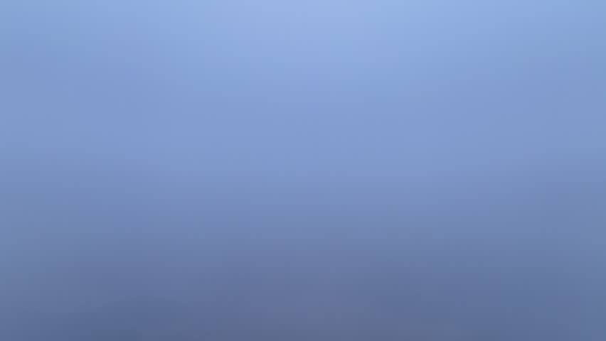Aerial Perspective of Remote Farmland, Forests, and Overcast Atmosphere
