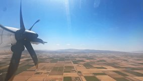 Aerial View of Propeller Plane Over Moroccan Farmland and Agricultural Fields - Powered by Shutterstock - Get 15% off with code: PIKWIZARD15