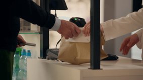 Health care worker woman pharmacist talk in pharmacy medical help advice customer buying pills medication package at cashier counter smiling girl medicine service drugstore pay contactless credit card - Powered by Shutterstock - Get 15% off with code: PIKWIZARD15