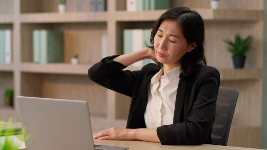 Sedentary computer work tired business woman Asian chinese korean japanese female girl office businesswoman feel pain massaging neck suffer ache tension muscles backache health problem overwork laptop