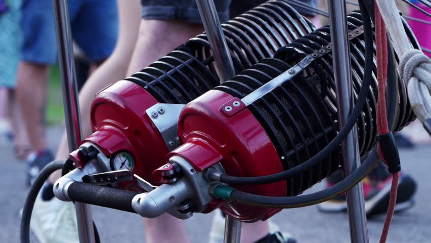 Close-up of the gas burner of a travel balloon.