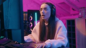 Frustrated sad woman gamer girl female streamer in headphones worry upset with fail loss bad result failure at computer online game playing in neon home room at night addiction gaming problem stream - Powered by Shutterstock - Get 15% off with code: PIKWIZARD15