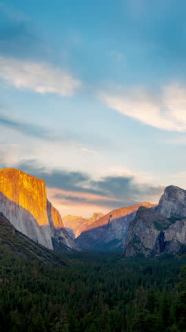 Time lapse video of Yosemite valley nation park during sunset view from tunnel view on twilight time. Yosemite nation park, California, USA.