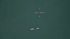 Top View shot drone Sports Rowing Boats with two Young Sportsmen.  - Powered by Shutterstock - Get 15% off with code: PIKWIZARD15