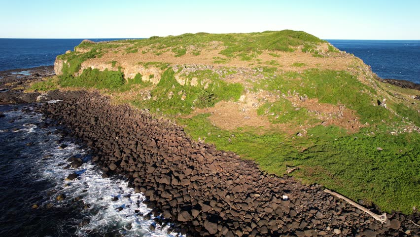Cook Island With Rocky Shore In NSW, Australia - Drone Shot