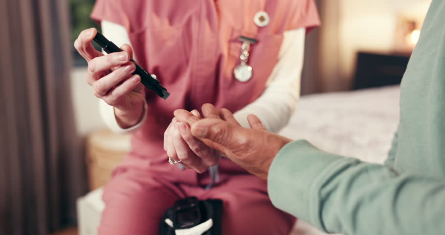 Nurse, hands and senior person with blood test for diabetes, elderly care and advice in home. Woman, caregiver and pensioner for healthcare, insulin check and medical monitor for exam and service