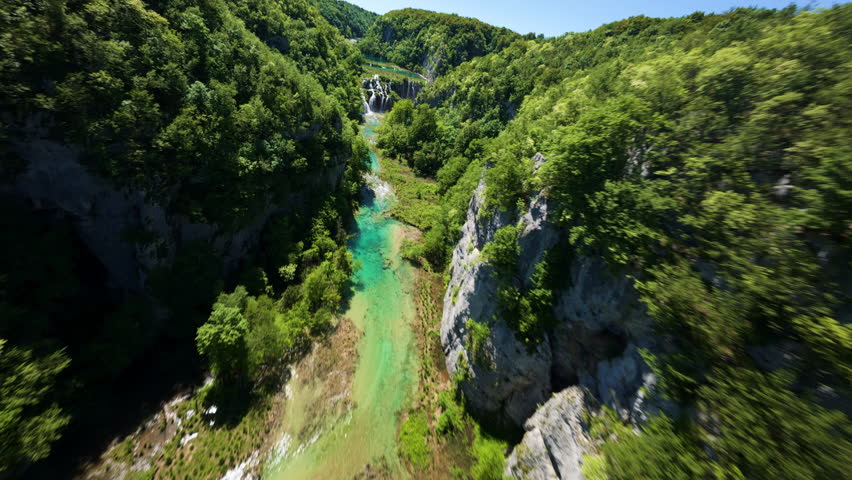 Fly Over Picturesque Lush Nature Of Plitvice Lakes National Park In Croatia. FPV