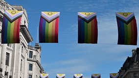Colourful Flags within Regents Street for Pride Month, London, United Kingdom - Powered by Shutterstock - Get 15% off with code: PIKWIZARD15