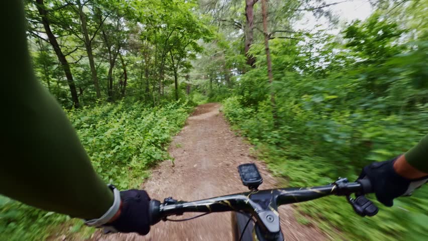 cyclist riding mountain bike. Adventure sport.Outdoor activity trail riding. mountain biking on full suspension bike. Nature ride cross-country xc. biking excitement. cyclist fitness cardio exercising