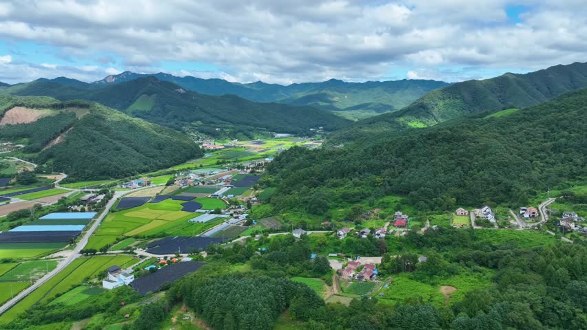 Aerial view of farmland and mountain village in Chuncheon, South Korea