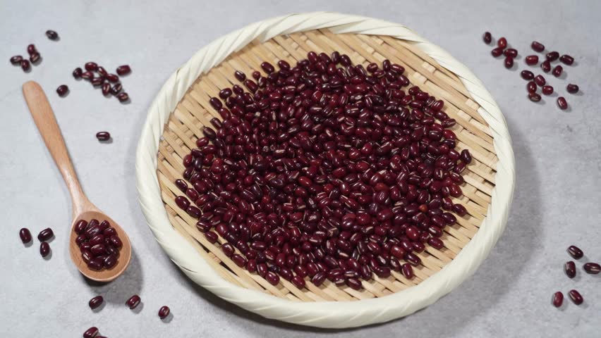 Azuki beans on a bamboo basket.A lot of red beans.