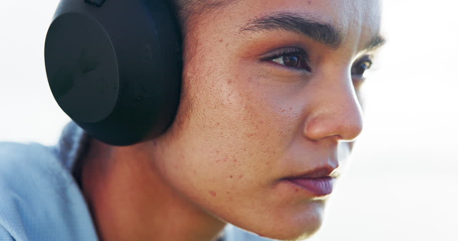 Breathe, fitness and woman with headphones thinking for running, marathon training and exercise. Sports, outdoor and person with music rest for fatigue, tired and break for workout, endurance or race