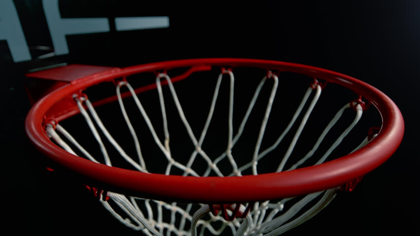 Super Slow Motion of Basketball Ball Going Through Hoop Net at 1000fps.