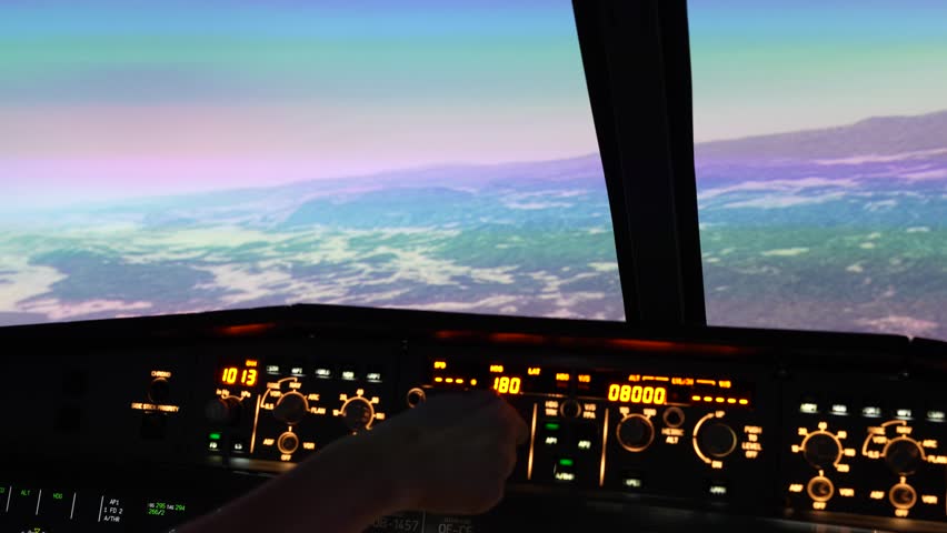 In-cockpit view of Airbus A320 flight deck - pilot adjusting throttle and controls in realistic flight simulator, clear instrument panel and sky view.