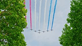 Planes with colored smoke. The colors of the French flag in the sky over Paris - Powered by Shutterstock - Get 15% off with code: PIKWIZARD15