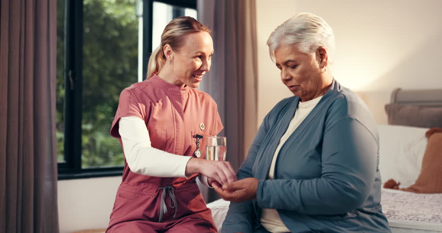 Happy women, nurse and senior patient with medication for medical symptoms or chronic illness. Female people, caregiver and elderly care with water, pills or assisted living for retirement healthcare
