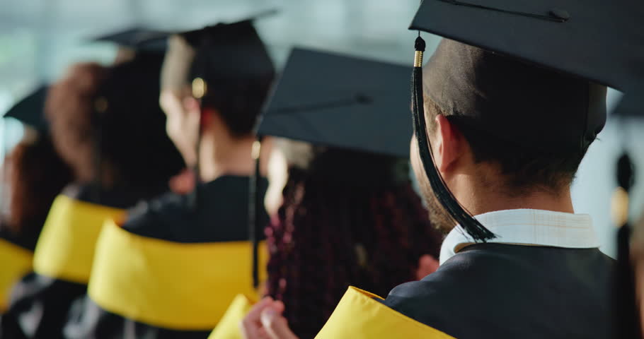 Man, students and applause at graduation ceremony for education, achievement and announcement. Back, people and clapping hands in row for award event, academic success and congratulations for diploma