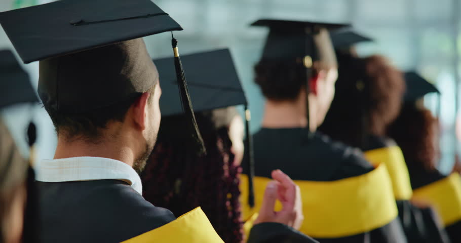 Man, students and applause at graduation event for education, achievement and announcement. Back, people and clapping hands in row for award ceremony, academic success and congratulations for diploma