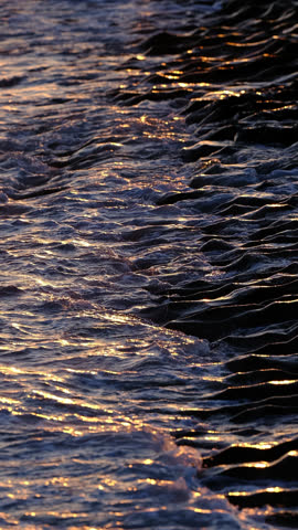 beautiful sea waves at sunset