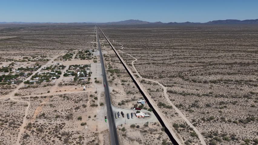 Aerial view of the border wall between Mexico and the United States, located in Sonoyta, Sonora on the Mexican side and Arizona on the US side.