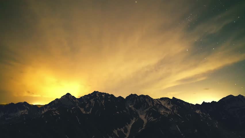 Beautiful night landscape,  snow coverd mountains under starry night. 