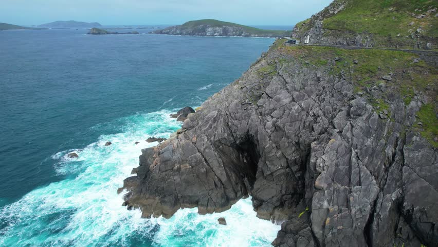 Epic Locations Ireland dramatic view of Slea Head Drive high above the Atlantic Ocean and Blasket Islands wild Ireland trips