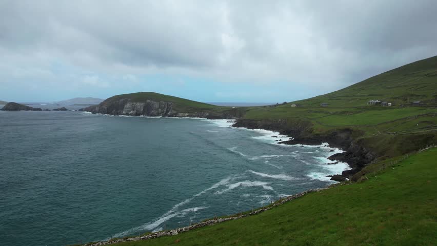 Dramatic drone view Duin Caoin Slea Head Kerry Ireland early morning with wild Atlantic swell and seas