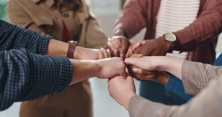 Holding hands, circle and business people in office for teamwork, collaboration and community. Professional, startup company and workers with support for solidarity, cooperation and partnership