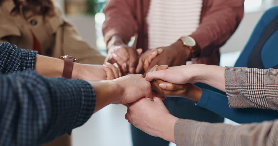 Holding hands, circle and business people in office for teamwork, collaboration and community. Professional, startup company and workers with support for solidarity, cooperation and partnership
