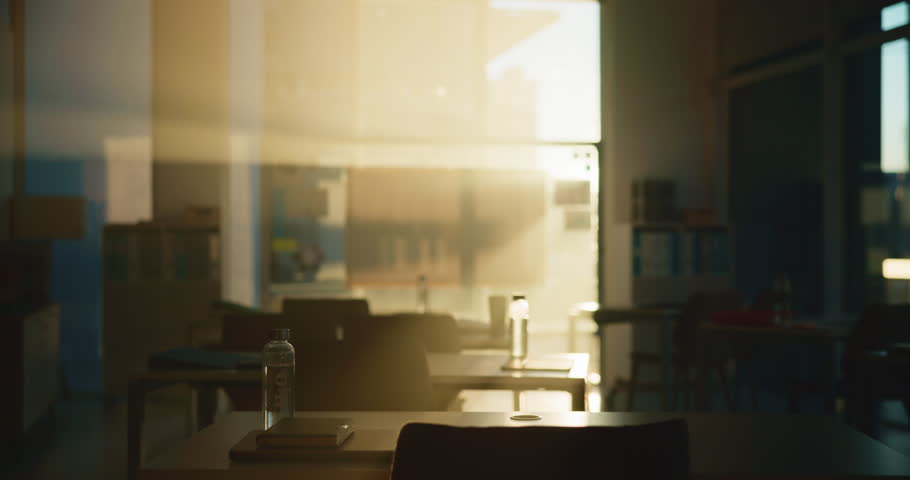Empty, classroom and table for education, school or interior of university, knowledge and furniture. Vacant, chairs and desk with supplies for exam, scholarship and assignment in college or academy