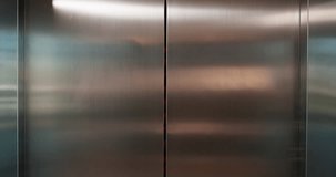 Leaving, elevator and woman with smartphone, office or checking time with tech, serious or schedule. Open, lift and arrival at work with transportation, online or black person with mobile for meeting - Powered by Shutterstock - Get 15% off with code: PIKWIZARD15