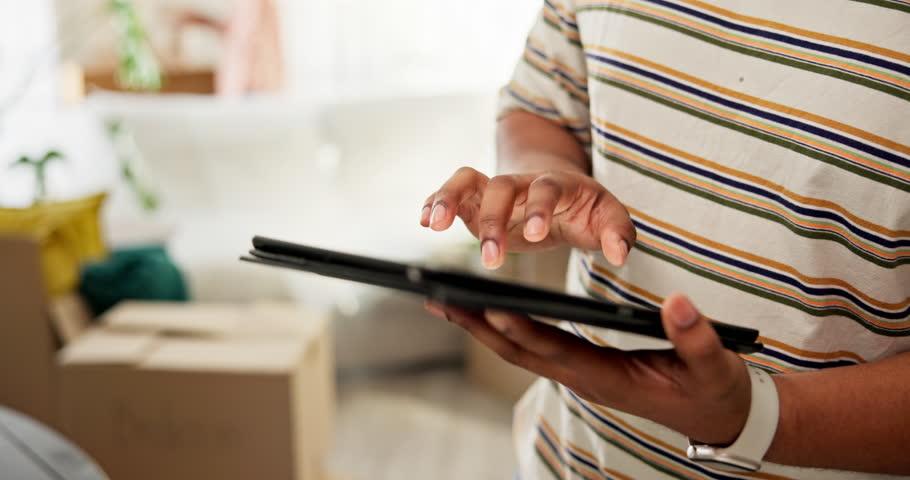Hands, moving and man with tablet in home for furniture checklist, packing boxes and relocation. Property investment, couple and tech for inventory planning, organize items or immigration preparation