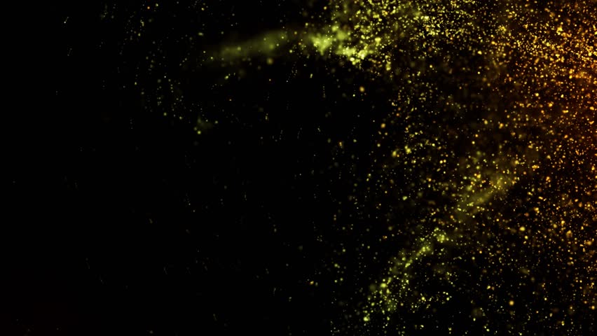 Golden particles moving in slow motion on black background 4k footage, Gold litters footage, particles moving footage, gold glitters footage, particles explosion. Animation video transparent backgroun