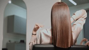 Woman after keratin haircare procedure. Healthy hair care treatment in salon. - Powered by Shutterstock - Get 15% off with code: PIKWIZARD15