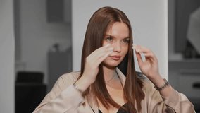Woman after keratin haircare procedure. Healthy hair care treatment in salon hairdresser. - Powered by Shutterstock - Get 15% off with code: PIKWIZARD15