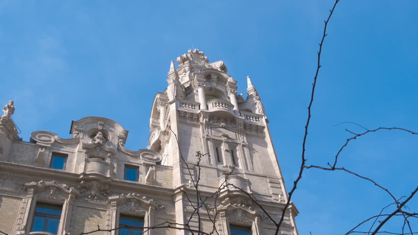 One famous house of budapest architecture. A view of famous building with white fasade in Budapest.