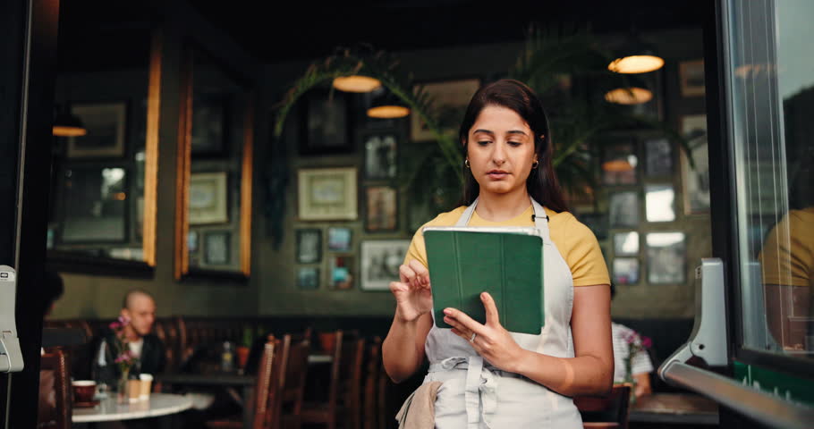 Woman, waiter and stress with tablet at coffee shop with lost sale, mistake or 404 glitch on menu app. Person, server and scroll with tech, bad review or restaurant management with supplier delay