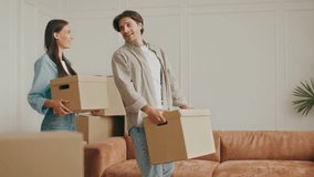 Family relocating to new apartment together while packing boxes - Powered by Shutterstock - Get 15% off with code: PIKWIZARD15