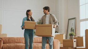 Family preparing for relocation to new apartment with moving boxes - Powered by Shutterstock - Get 15% off with code: PIKWIZARD15