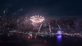 An aerial view captures vibrant fireworks illuminating the San Francisco skyline on Independence Day, showcasing a magnificent display of colors and lively celebrations that embody the holiday spirit - Powered by Shutterstock - Get 15% off with code: PIKWIZARD15