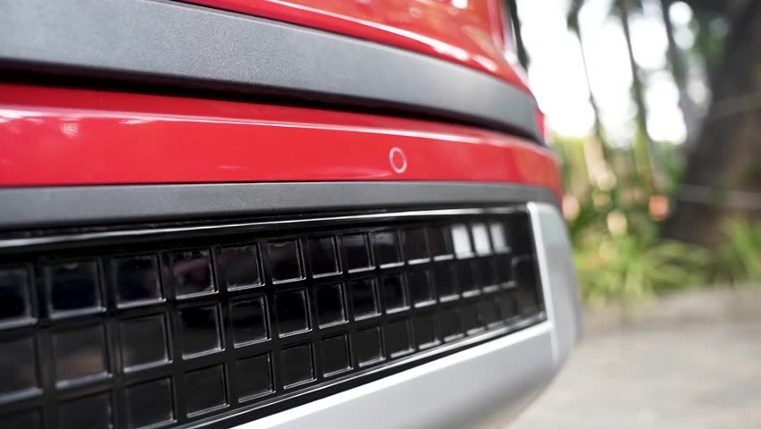 Stylised closeup shot of front grill of car.	