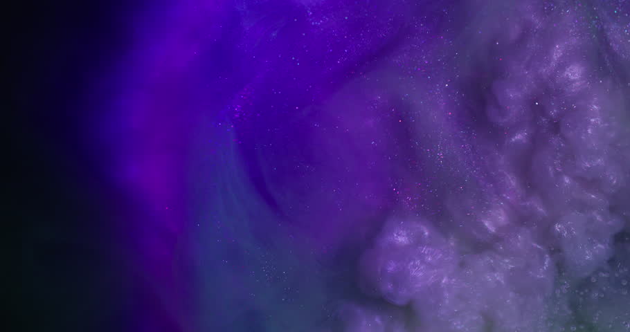 Glitter fog. Sparkling ink wave. Defocused purple blue neon color swirling bright fume floating on abstract dark black background.