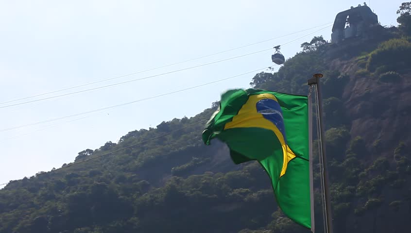 Brazilian flag with a blue sky 