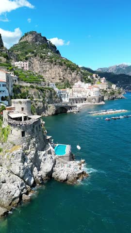 Amalfi coast Italy Europe village popular summer holiday destination, aerial drone vertical video