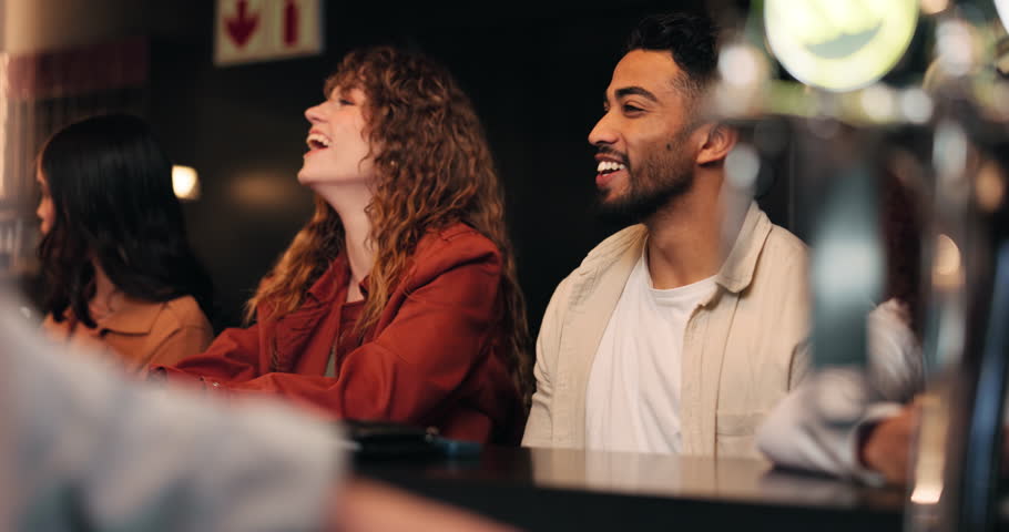 Conversation, date and laughing with couple at restaurant bar together for bonding or nightlife. Funny, love and romance with happy people talking in pub for evening celebration or relationship